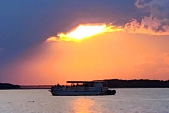 a sunset over a body of water